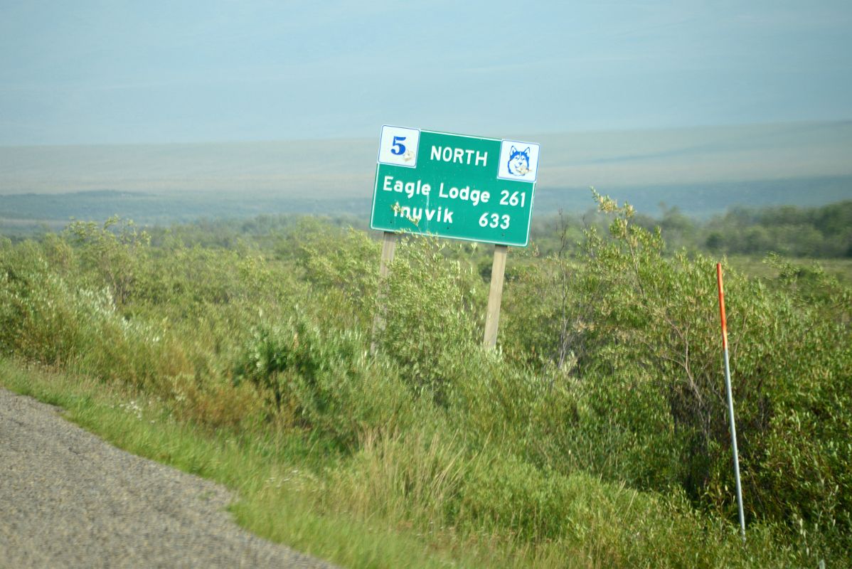 19A Dempster Highway Road Sign To Eagle Lodge 261km And Inuvik 633km In Tombstone Park Yukon